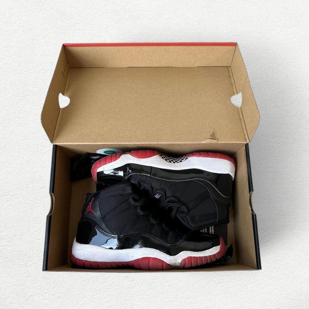 Nike Air Jordan 11 Retro Playoffs (GS) in Black White Red